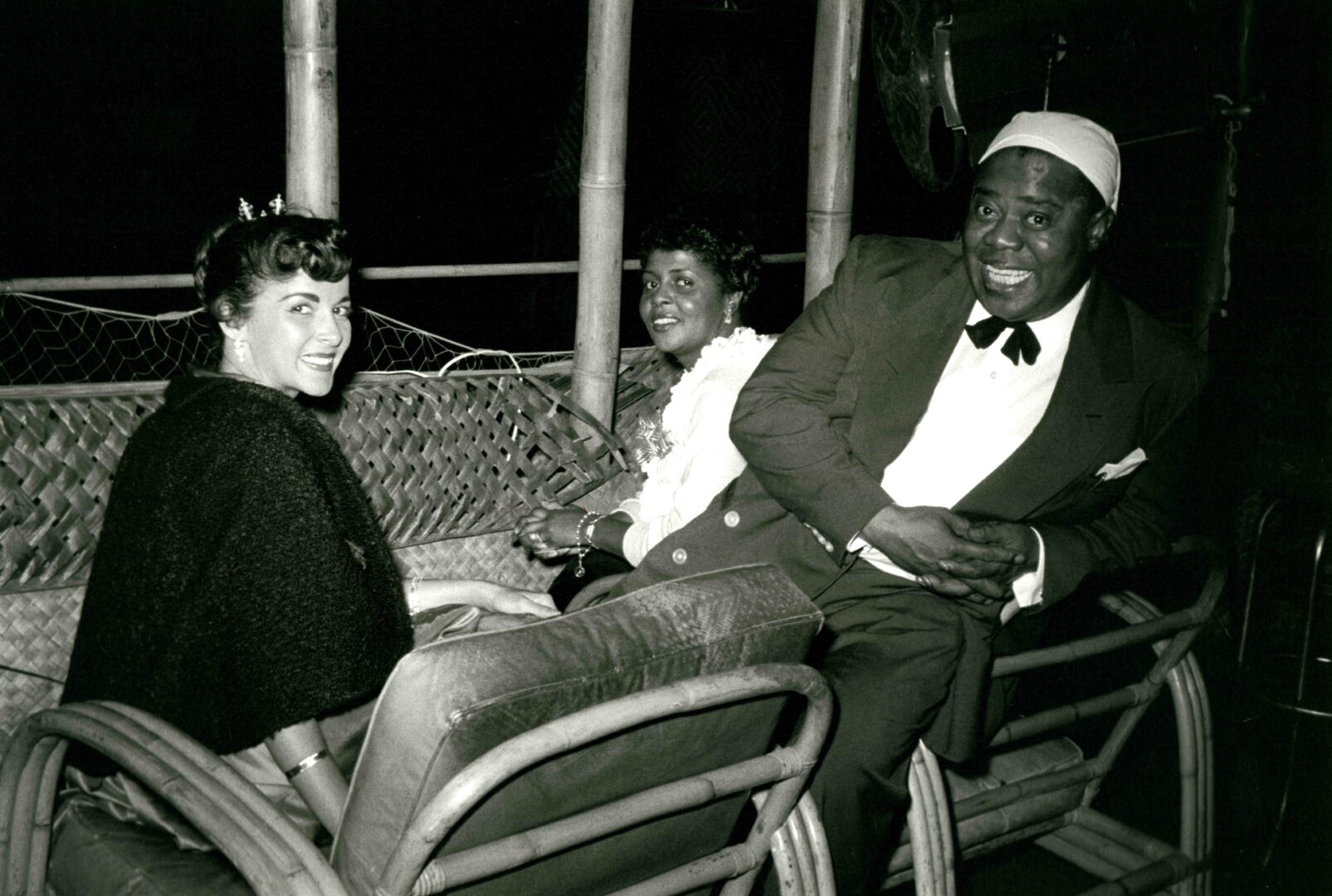 Milt Hinton Vicksburg, MS 1910–2000 New York City Lucille and Louis Armstrong with a friend, Honolulu, Hawaii, ca. 1954, 1954 Gelatin silver print Gift of Hank O'Neal and Shelley M. Sheir, 2023 2023.15 8 ½ in. x 13 in. (f) currently unframed FF19 Condition: checked