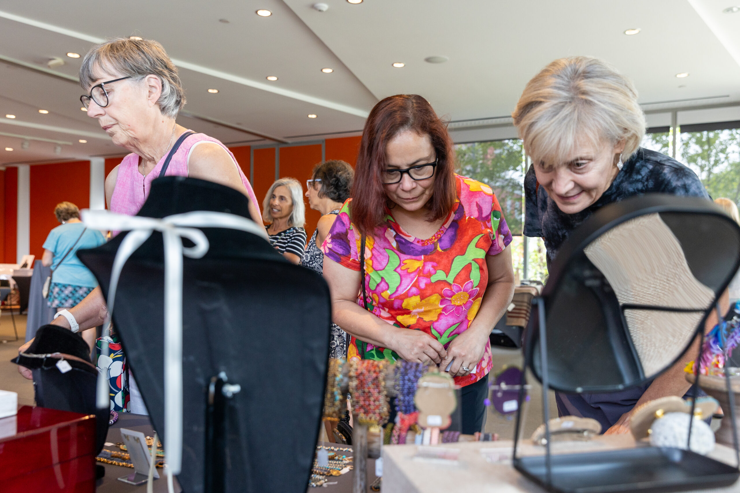 Attendees at a Shop Event Looking at Vendor Merchandise